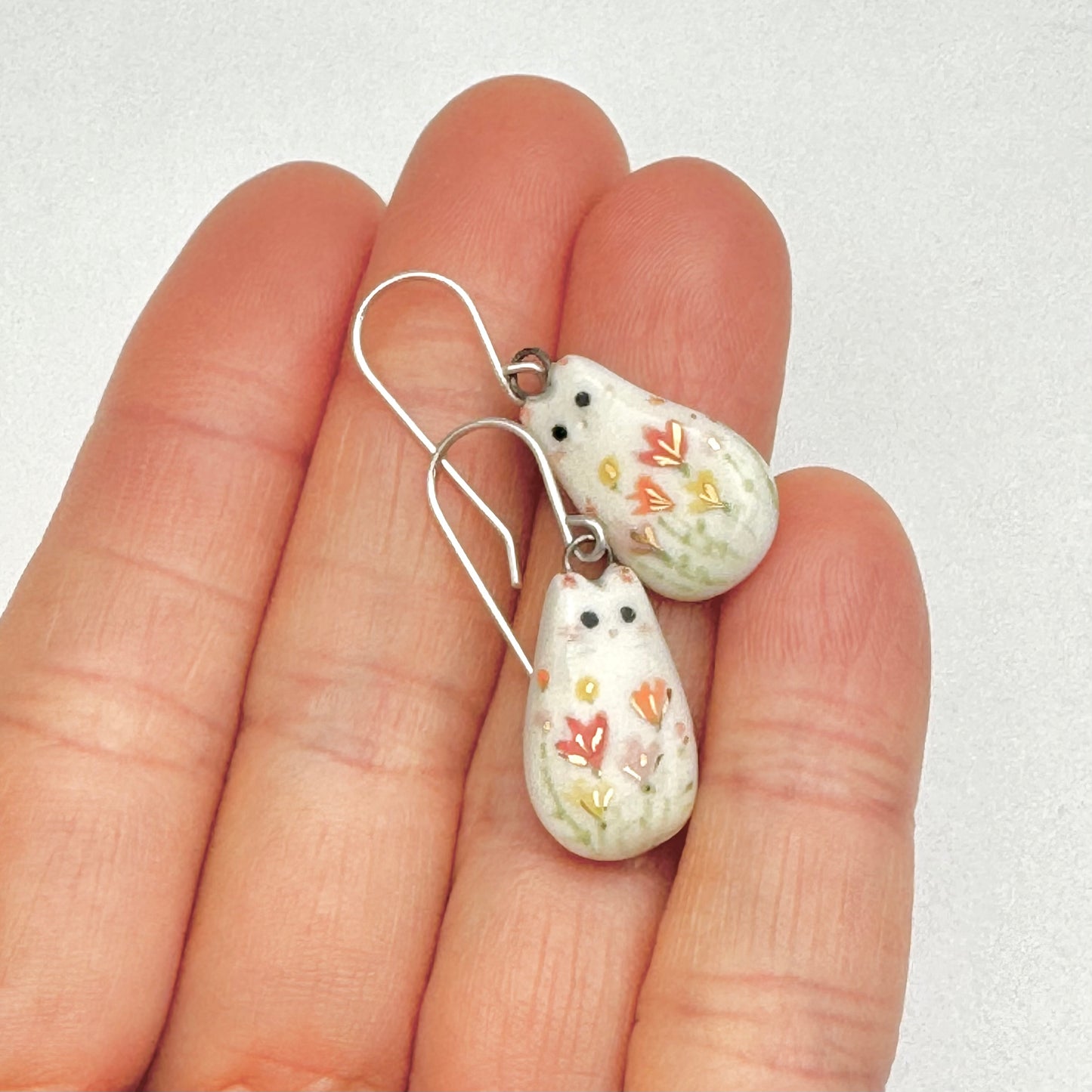 Flower Accented Cat Earrings