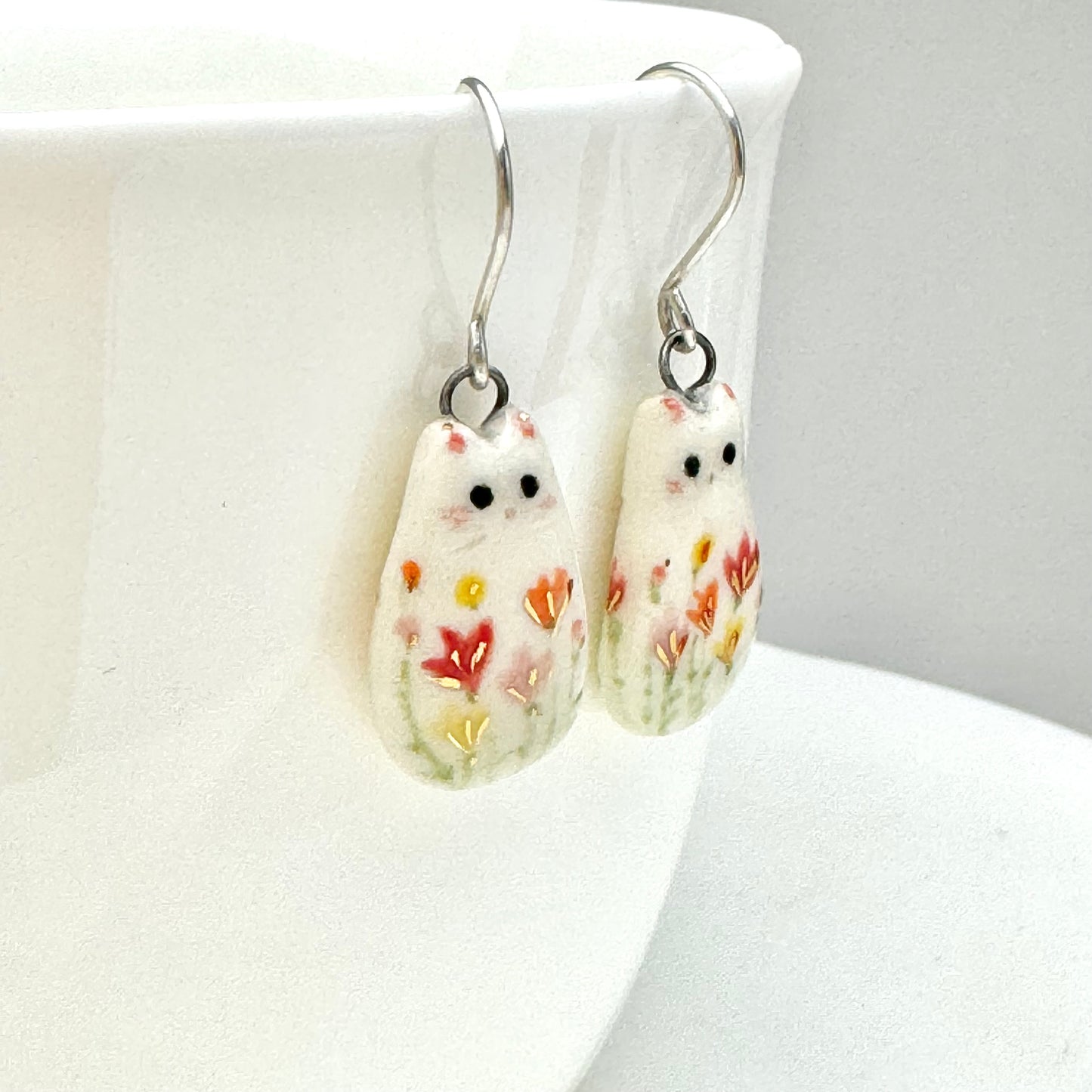 Flower Accented Cat Earrings