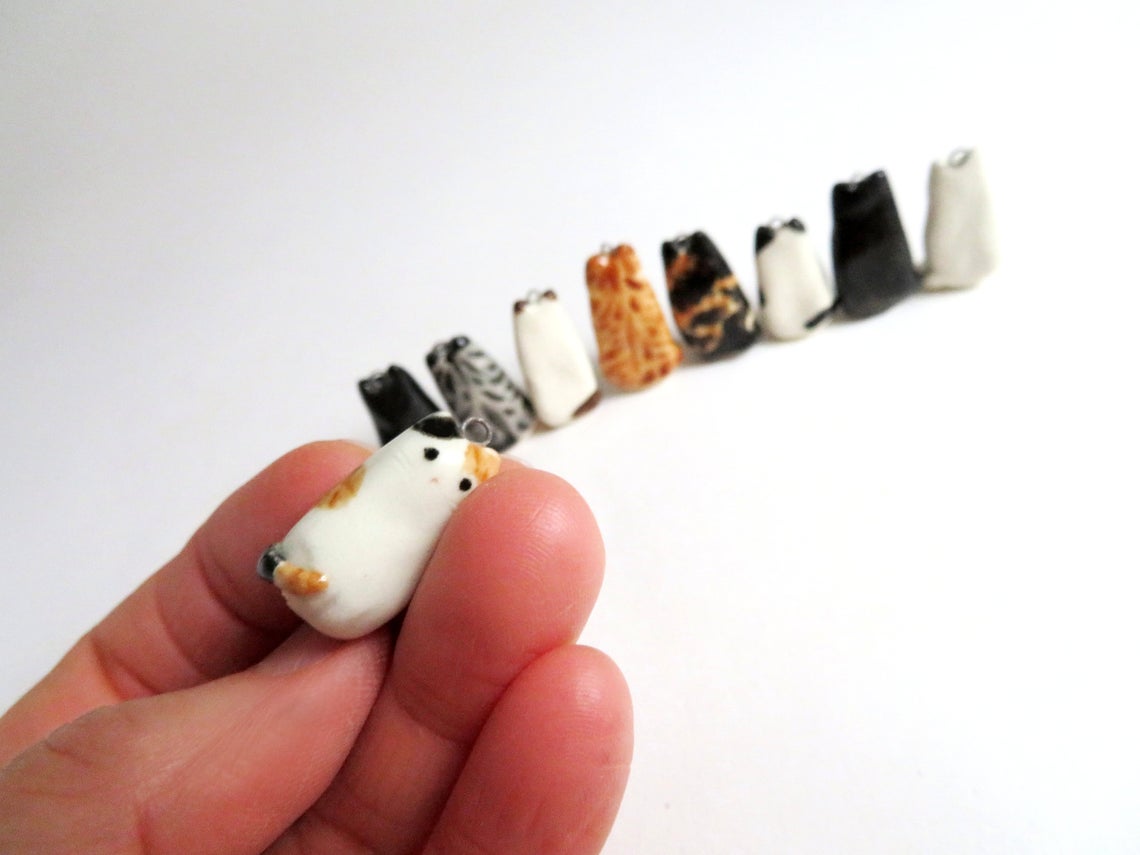 Calico cute cat charm close up
